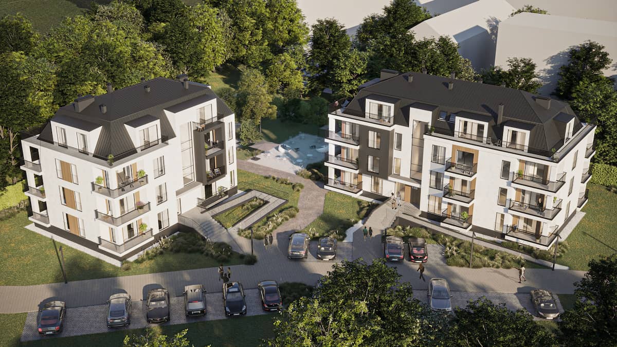 Widok na oba budynki apartamentów na łąkach